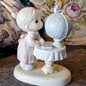 "What The World Needs Now" Precious Moments Figurine. In Excellent Condition.